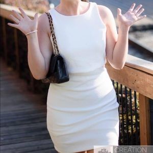 White cotton dress with sheer waist cut-outs